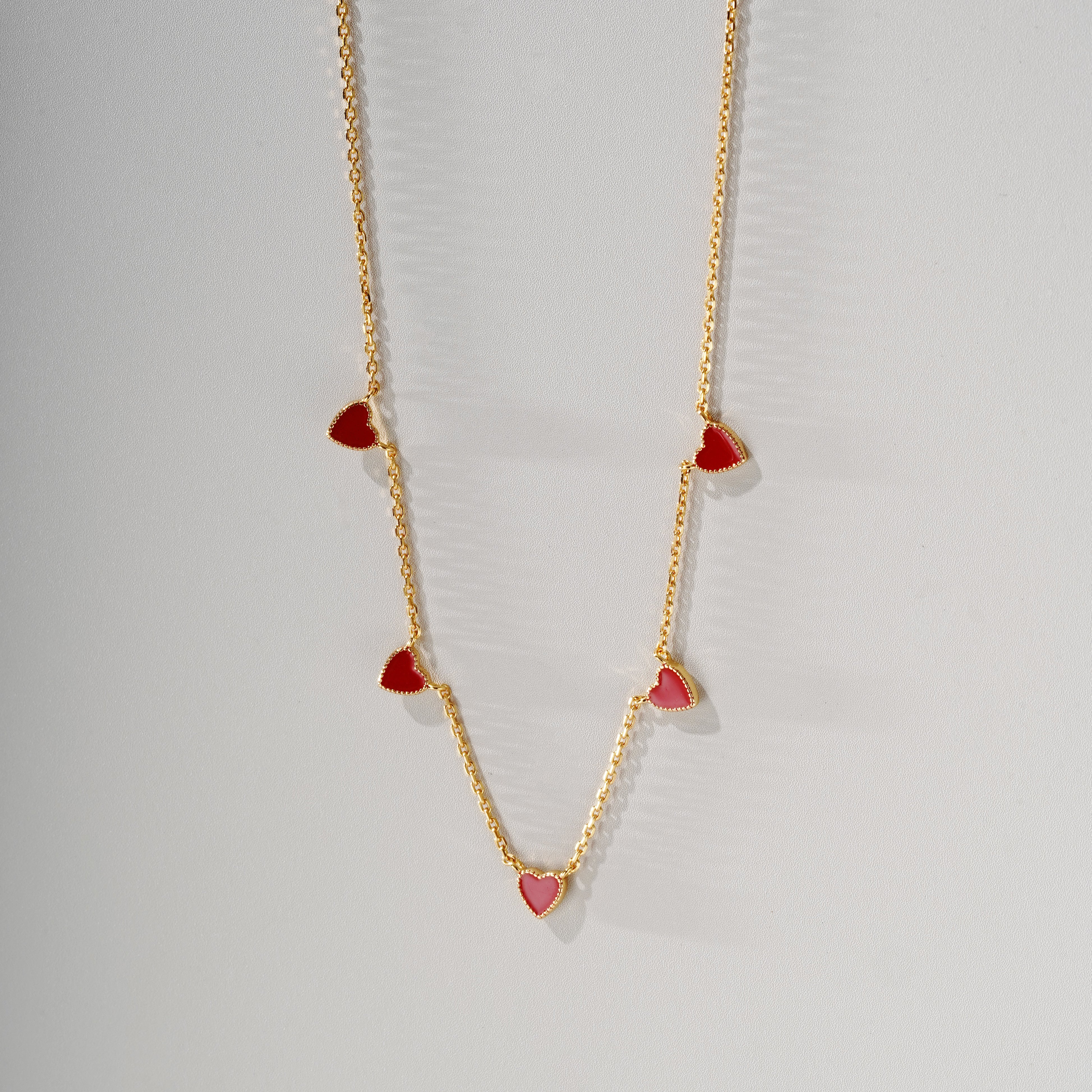 Five Red Enamel Hearts on Gold Chain
