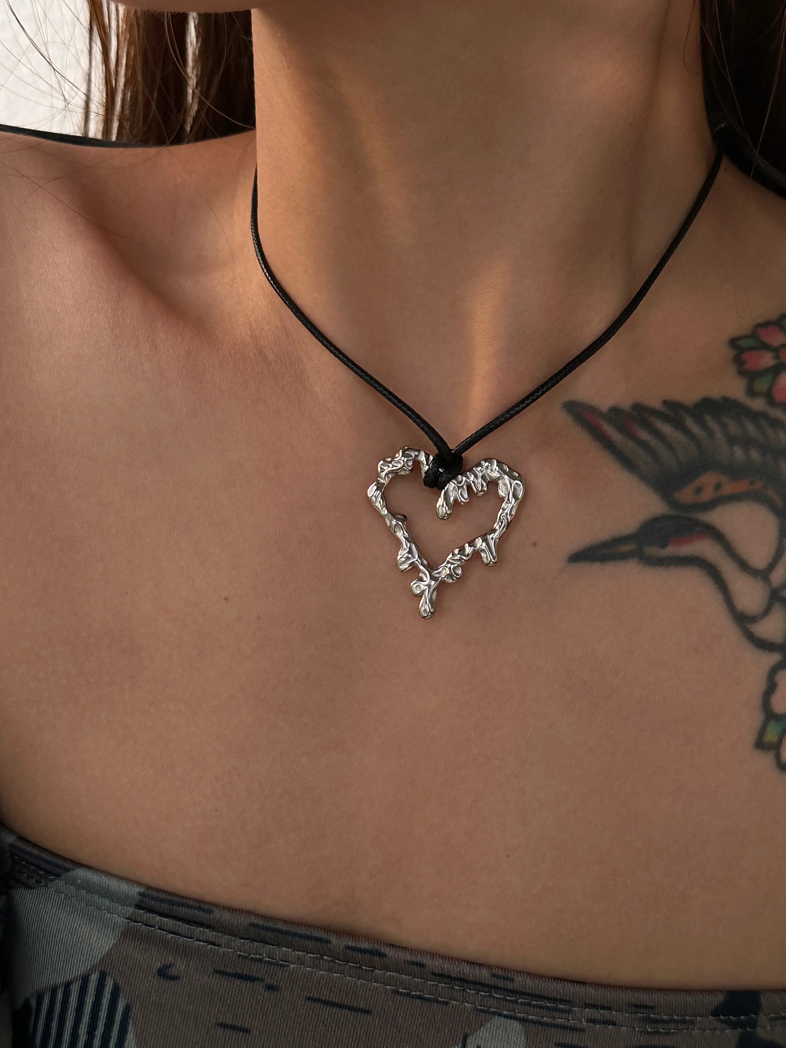 “Bleeding” Heart on Black Leather Necklace