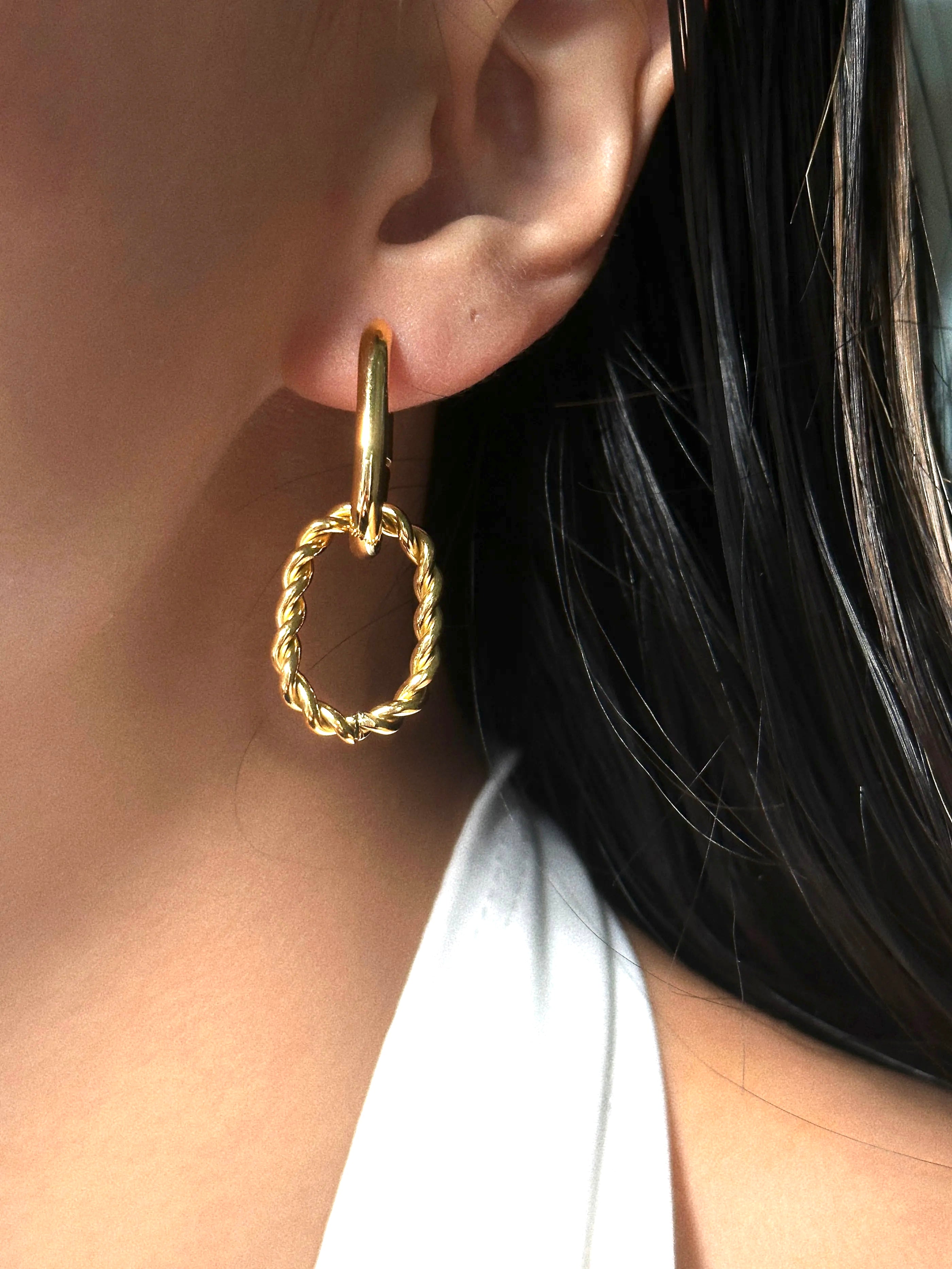 Gold Twist Link Hoop Earrings on Model