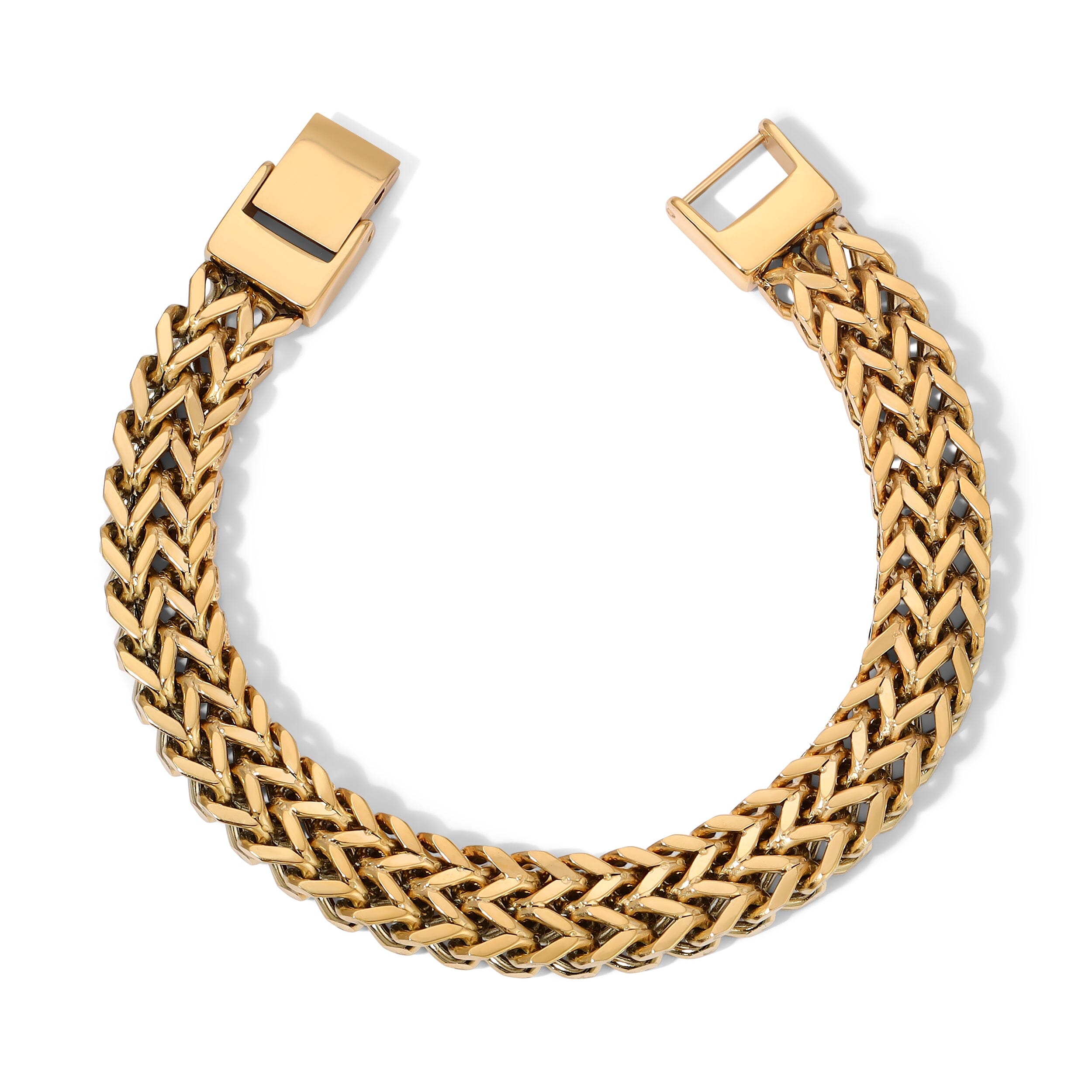 Cora bold gold Cuban chain bracelet shown open with its rectangular clasp on a white background