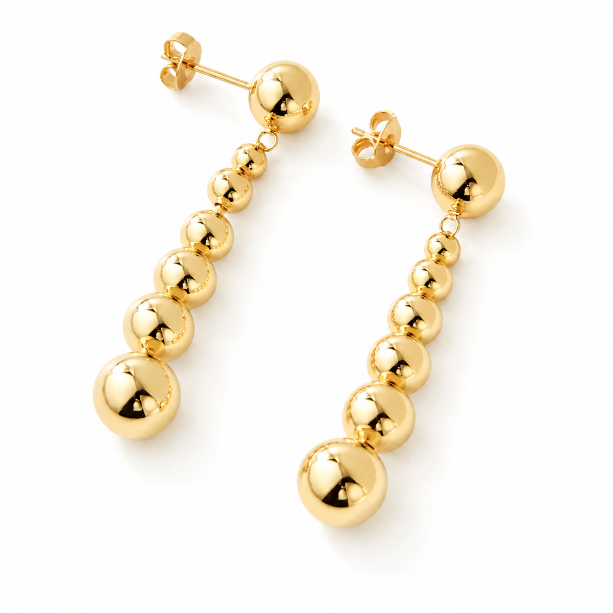 A pair of gold drop earrings with a series of polished spherical beads hanging from a single round bead, shown on a plain white background.