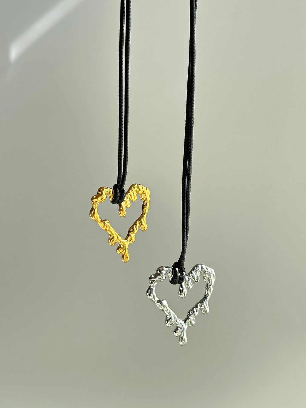 Bleeding” Heart on Black Leather Necklace