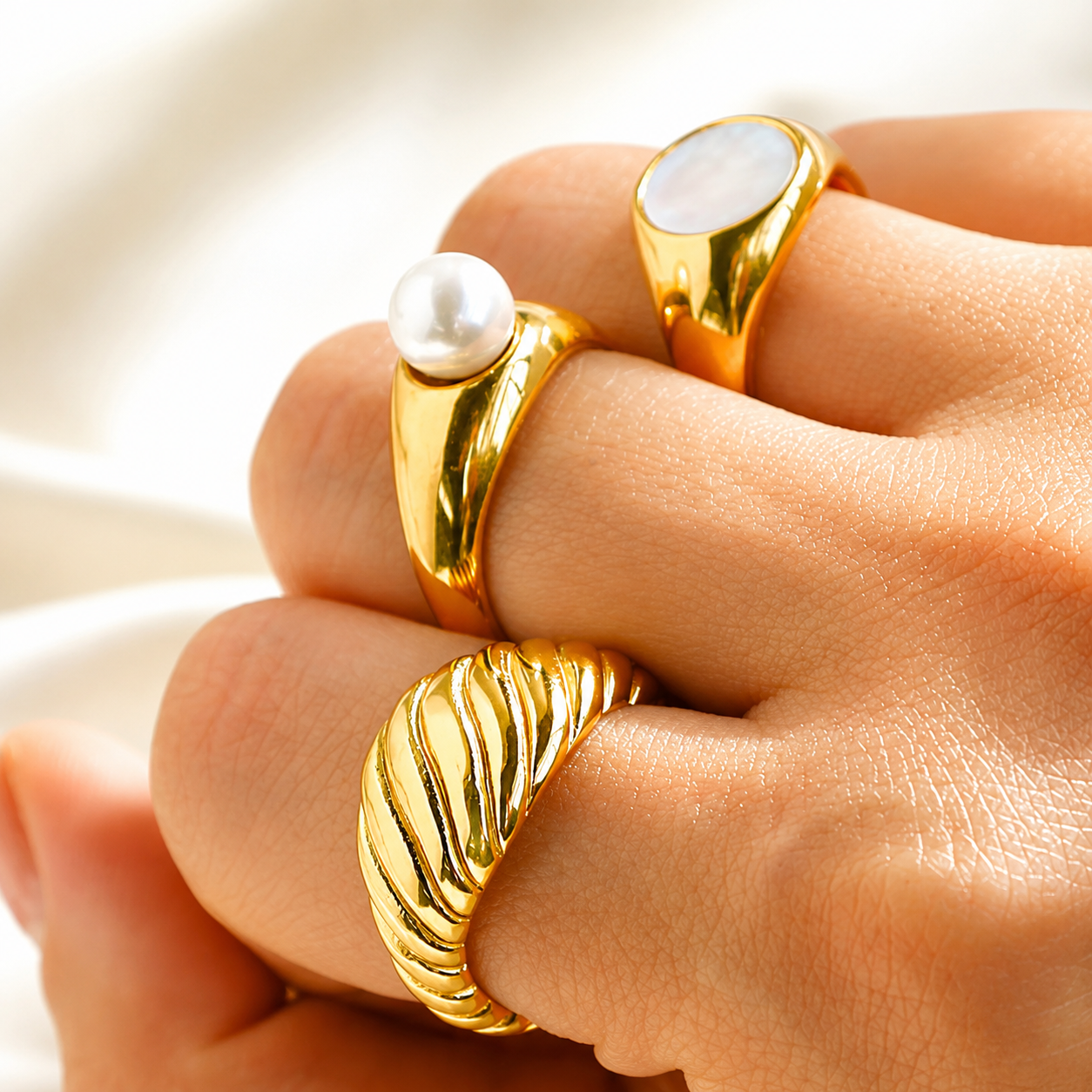     Hollis Croissant Twisted Dome Ring in 18K Gold Plated Stainless Steel by Bloo & Ro