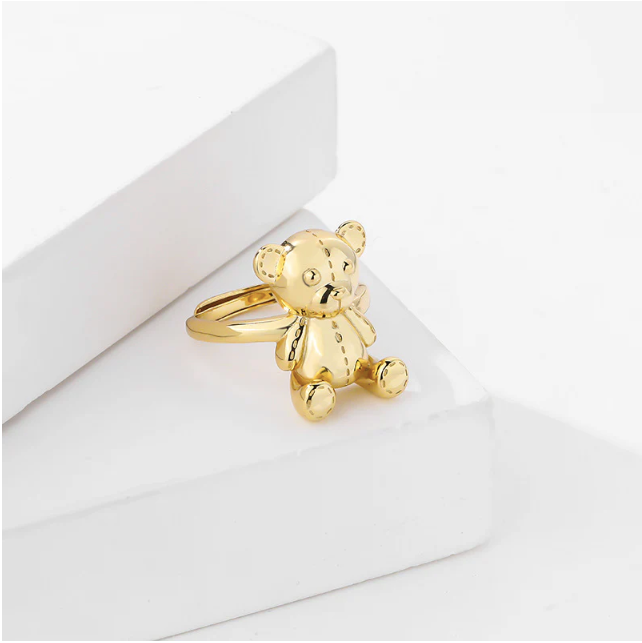 Gold teddy bear ring 14K plated on sterling silver with a polished finish on a white background 