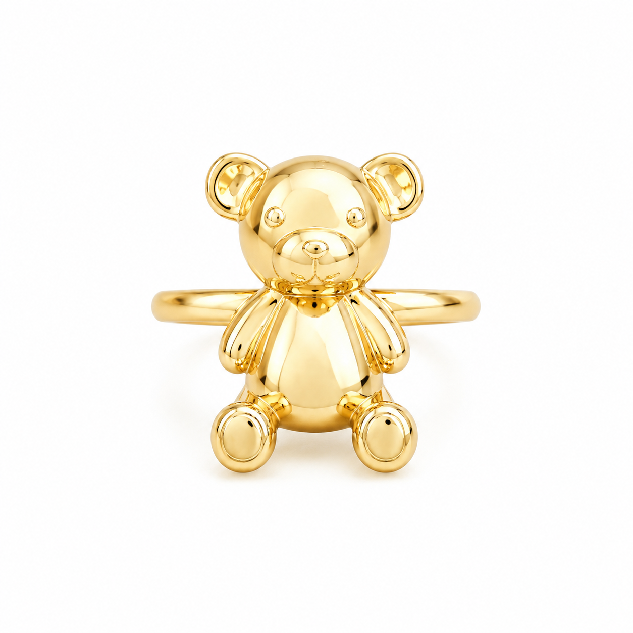 Gold teddy bear ring with a polished finish on a white background.