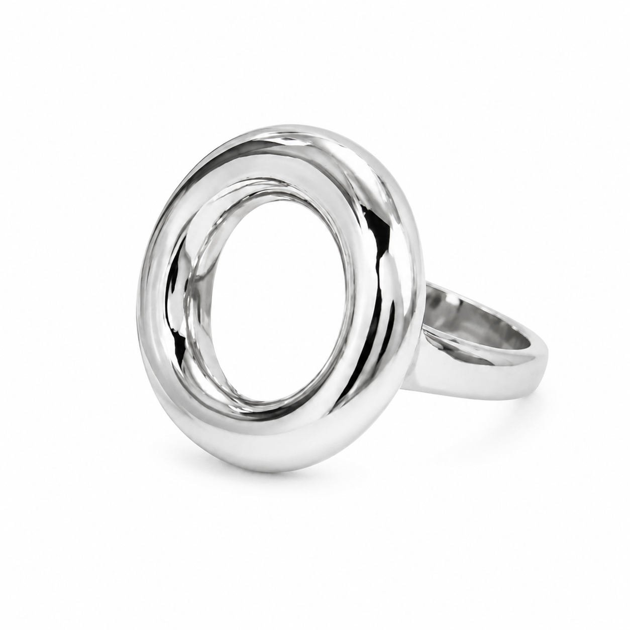 A polished silver ring featuring a large, open oval design with a smooth, reflective band, shown on a clean white background.